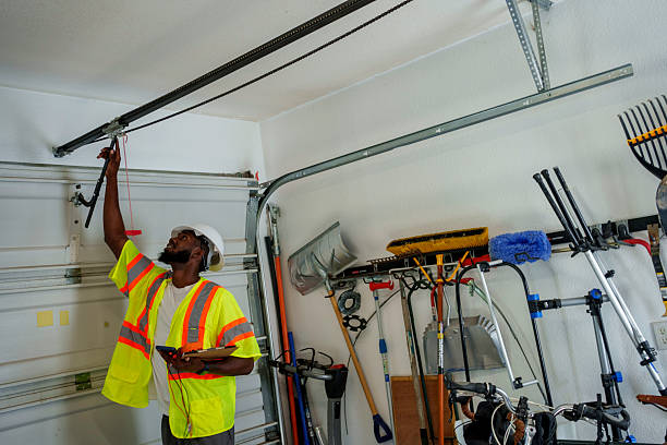Professional Garage Door technician working in Oak Ridge North, TX